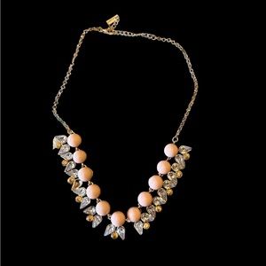 Jewelmint costume jewelry necklace.  Peach and gold tones Never worn NWOT
